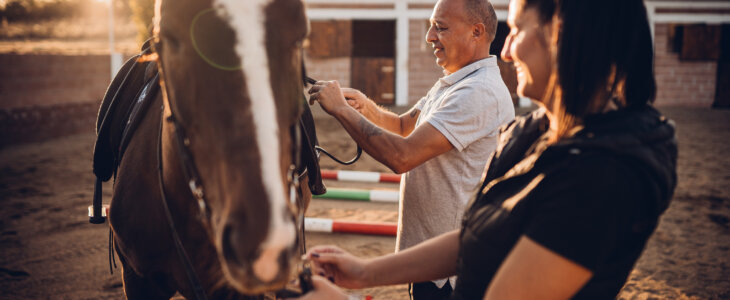 Horse riding trainer and student